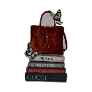 Designer Handbag and Book Stack Art